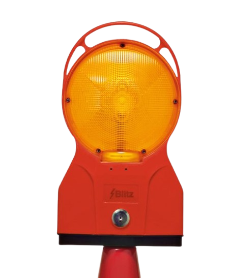 Orange Blitz-Warnleuchte im roten Gehäuse zur Absicherung von Baustellen und Gefahrenstellen.