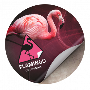 Runder Bodenaufkleber FLAMINGO mit Flamingo-Motiv und gelbem Warnsymbol und Schriftzug ‚Die Idee klebt.