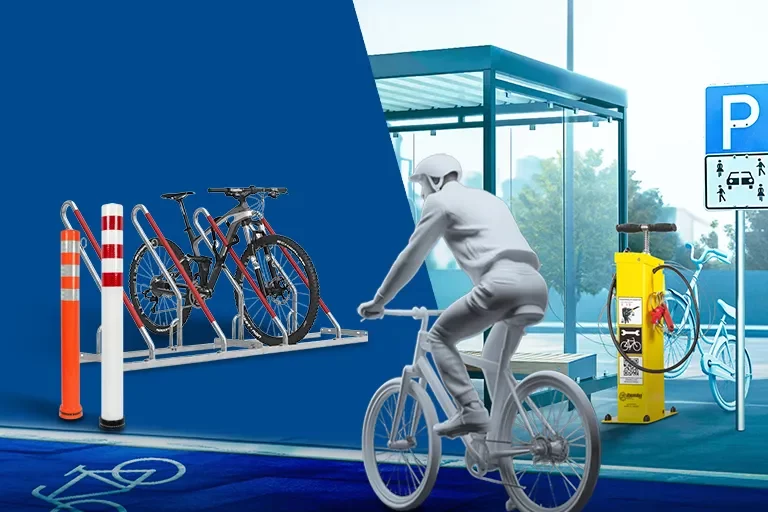 Fahrradständer mit mehreren Fahrrädern sowie Poller und Fahrrad-Reperatur-Station Ibombo neben Radweg