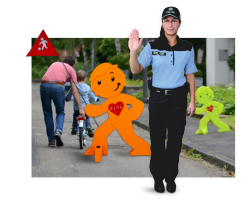 Warnfiguren für mehr Sicherheit auf dem Schulweg und Spielbereichen Warnfiguren einer Polizistin und eines Streetbuddies im Straßenraum machen Autofahrer auf Kinder aufmerksam.